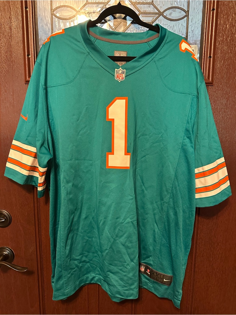 NFL Teal Football Jersey with Orange and White Accents